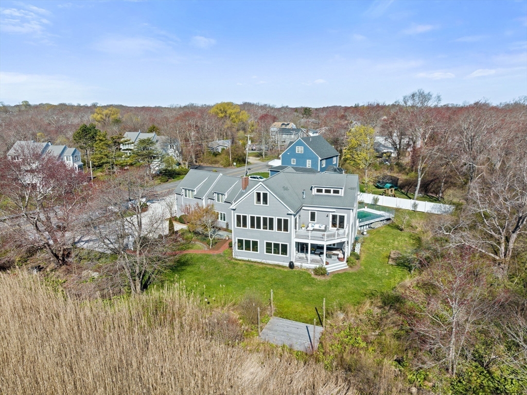 18 Hatherly Road Scituate, MA 02066 - Photo 35 of 42 a view of a big house with a big yard and large trees