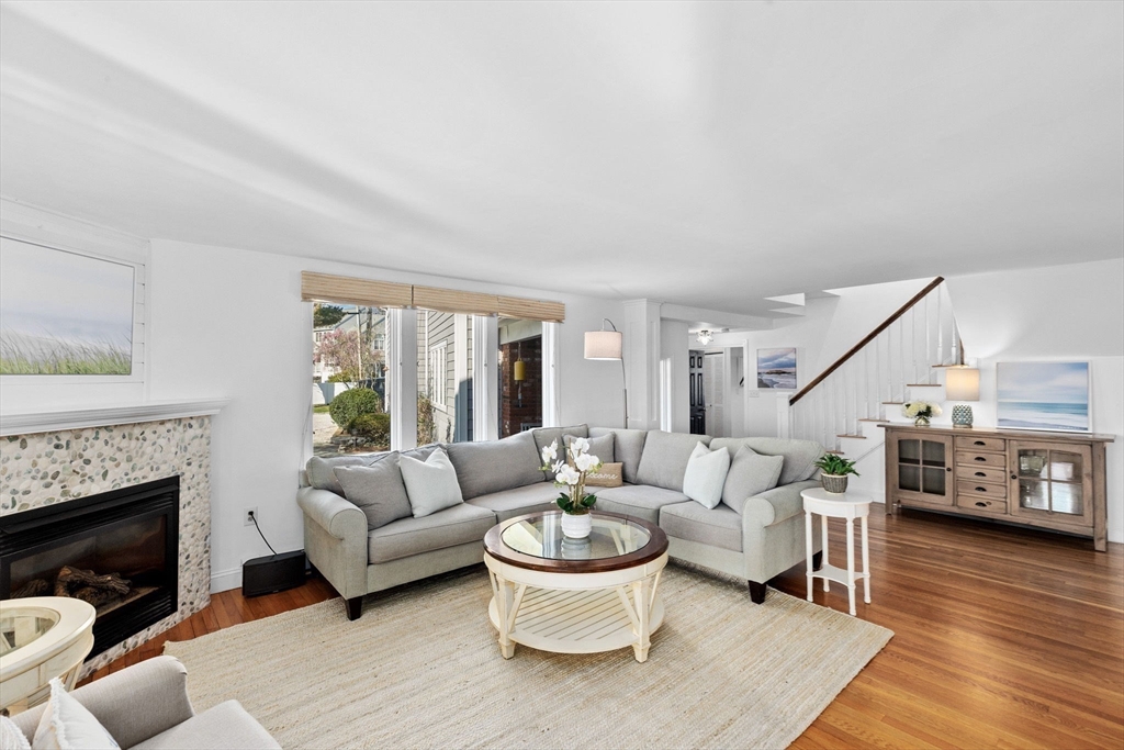 18 Hatherly Road Scituate, MA 02066 - Photo 4 of 42 a living room with furniture and a fireplace