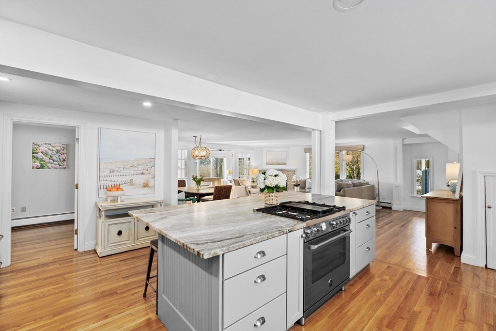 18 Hatherly Road Scituate, MA 02066 - Photo 10 of 42 a kitchen with a stove and a wooden floor