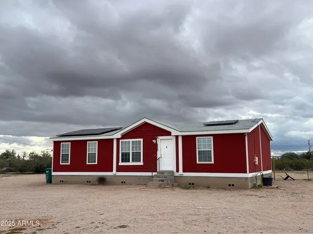 a front view of house with yard