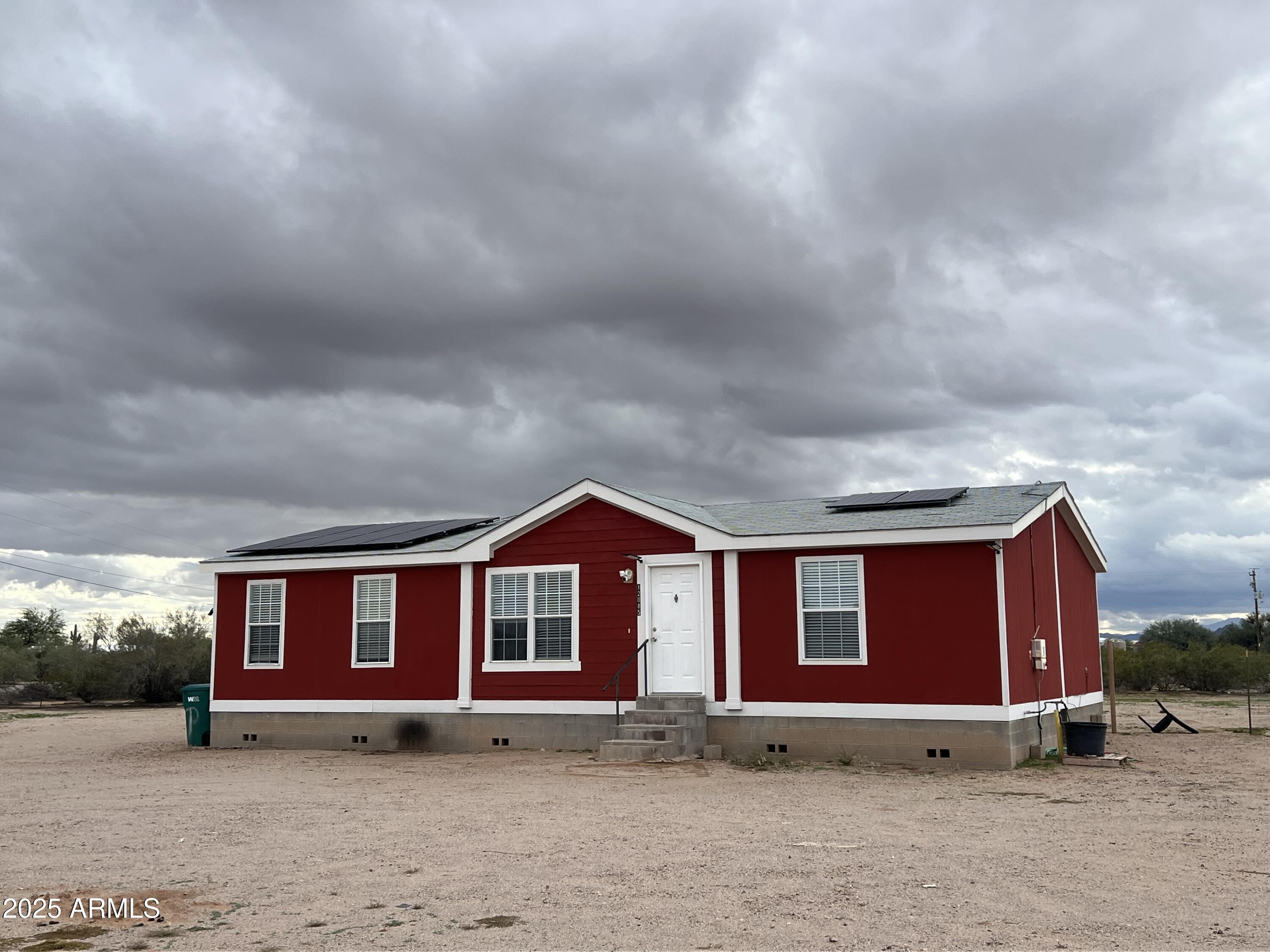 12085 North Musket Road Marana, AZ 85653 - Photo 2 of 13 a front view of house with yard