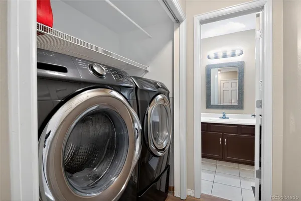 a view of a bathroom with washing machine