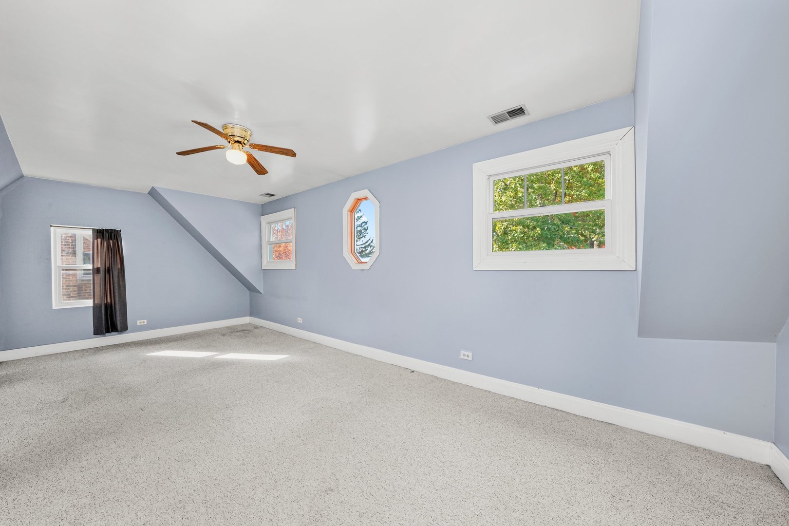 13115 South Escanaba Avenue Chicago, IL 60633 - Photo 9 of 24 a view of an empty room with a window