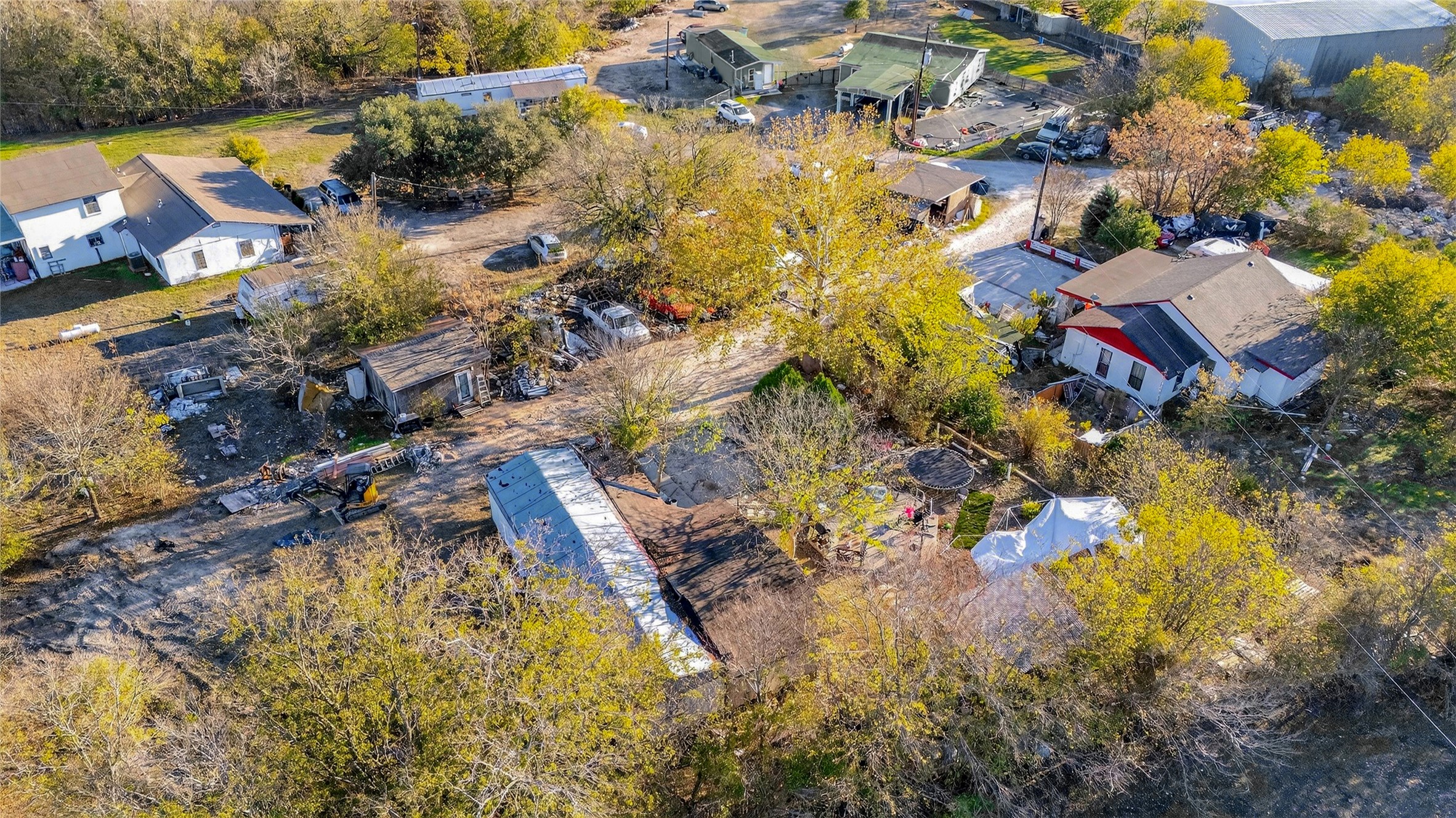 910 Petra's Way Kyle, TX 78640 - Photo 3 of 19 an aerial view of residential houses with outdoor space