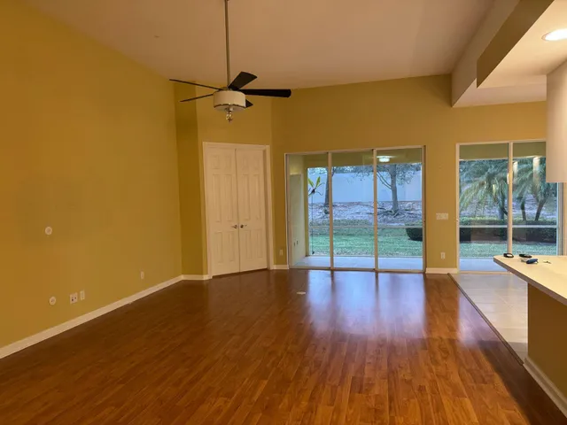 a view of a livingroom with wooden floor