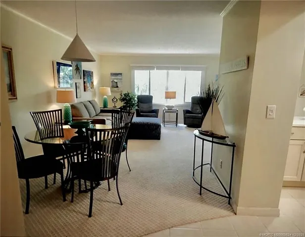 a view of a livingroom and dining room