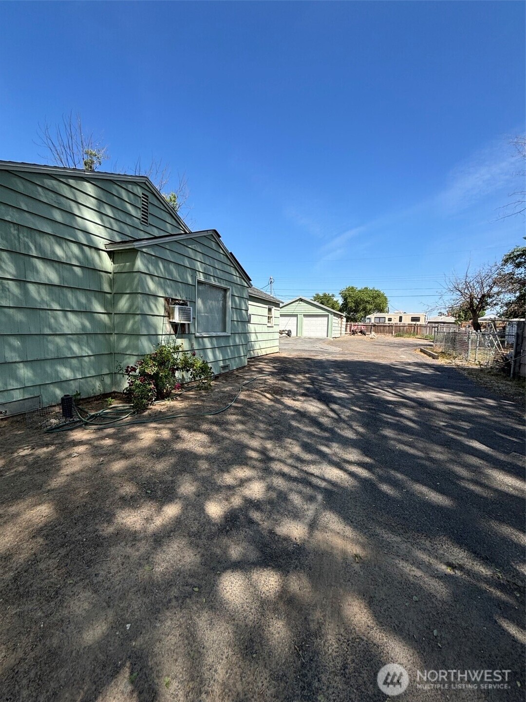 345 West Ridge Road Moses Lake, WA 98837 - Photo 7 of 8 a view of a street with a building in the background