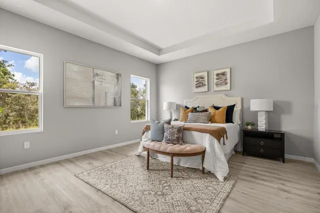 a bed room with a bed and a window