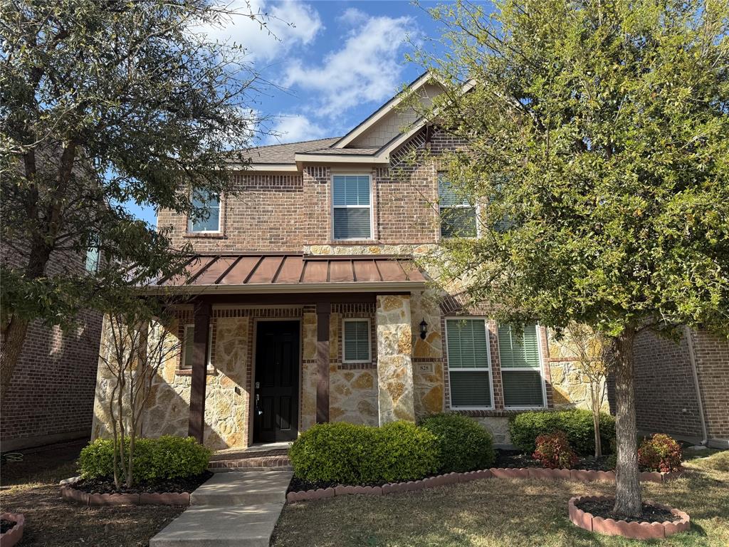 828 Birdie Drive Allen, TX 75013 - Photo 1 of 1 a front view of a house with garden