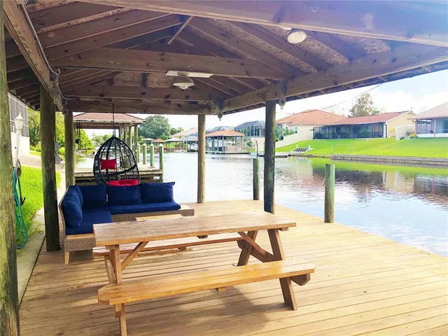 a view of a swimming pool with a patio