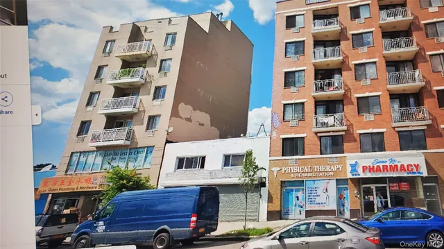 a front view of a building with lot of windows