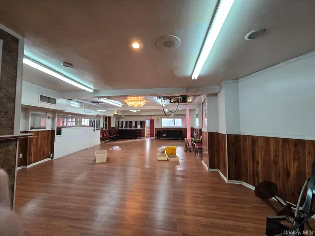 a view of a room with lots of wooden floor