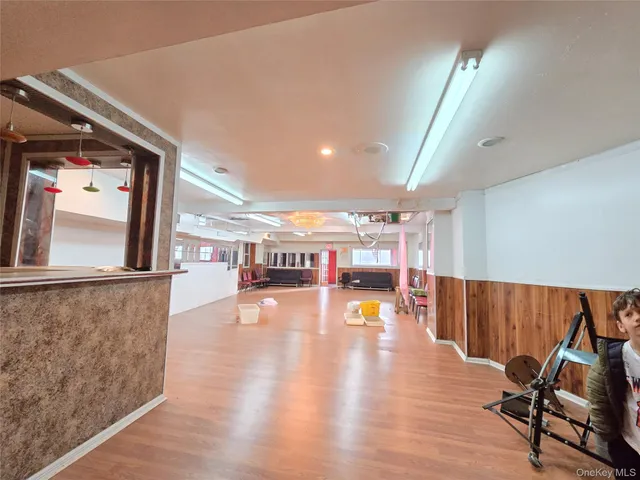 an entryway with wooden floor