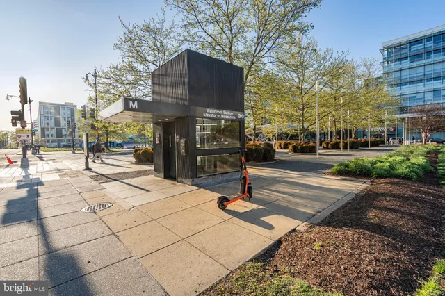 a view of a building with sitting area