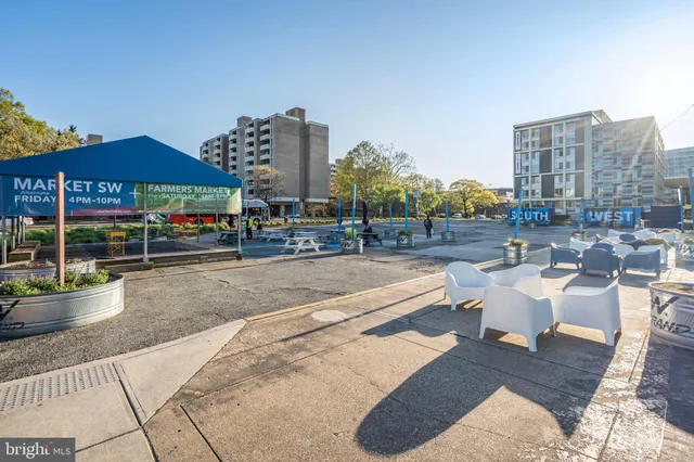 a view of street with small shops