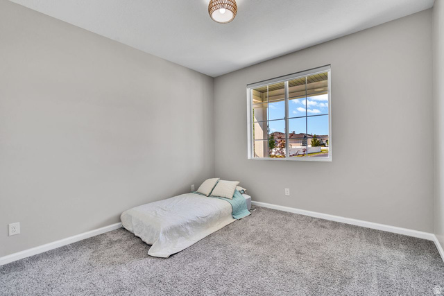 3269 West 650 North Layton, UT 84041 - Photo 18 of 35 Carpeted room with light grey walls and white trim