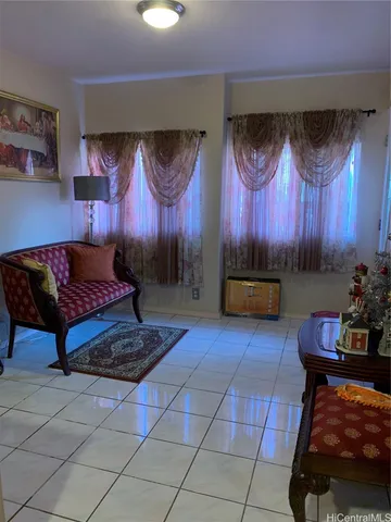 a room with furniture and lamp