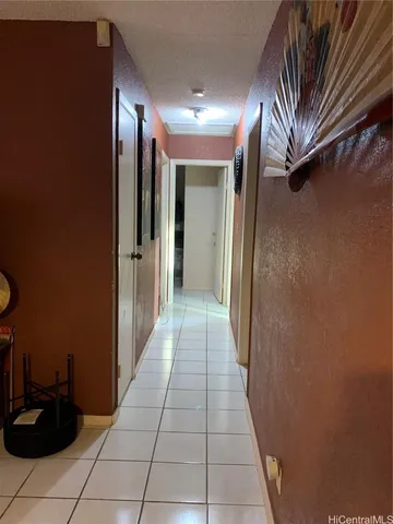 a hallway with a view of entryway