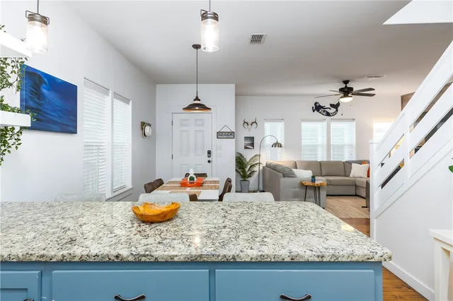 a very nice looking dining room with a table and chairs