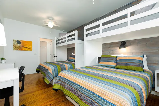 a bedroom with bed and a window