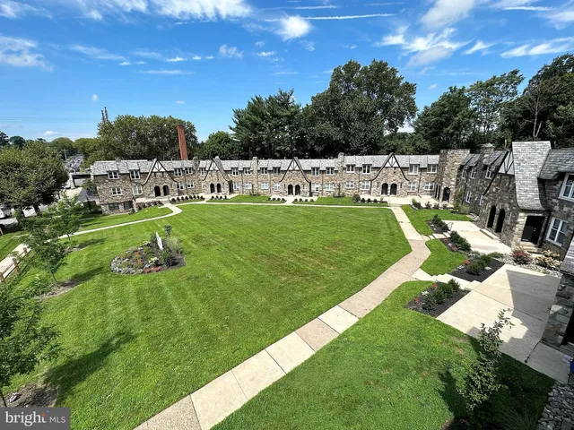 a view of a garden with an outdoor space