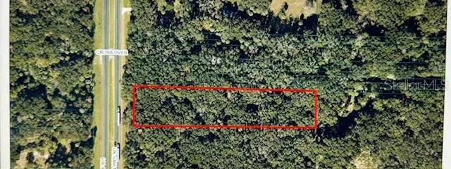 a sign board with a small yard