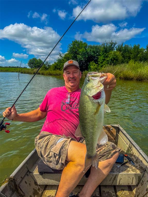 Tbd Camp Creek Road Temple, TX 76501 - Photo 25 of 40 a view of a lake in a backyard