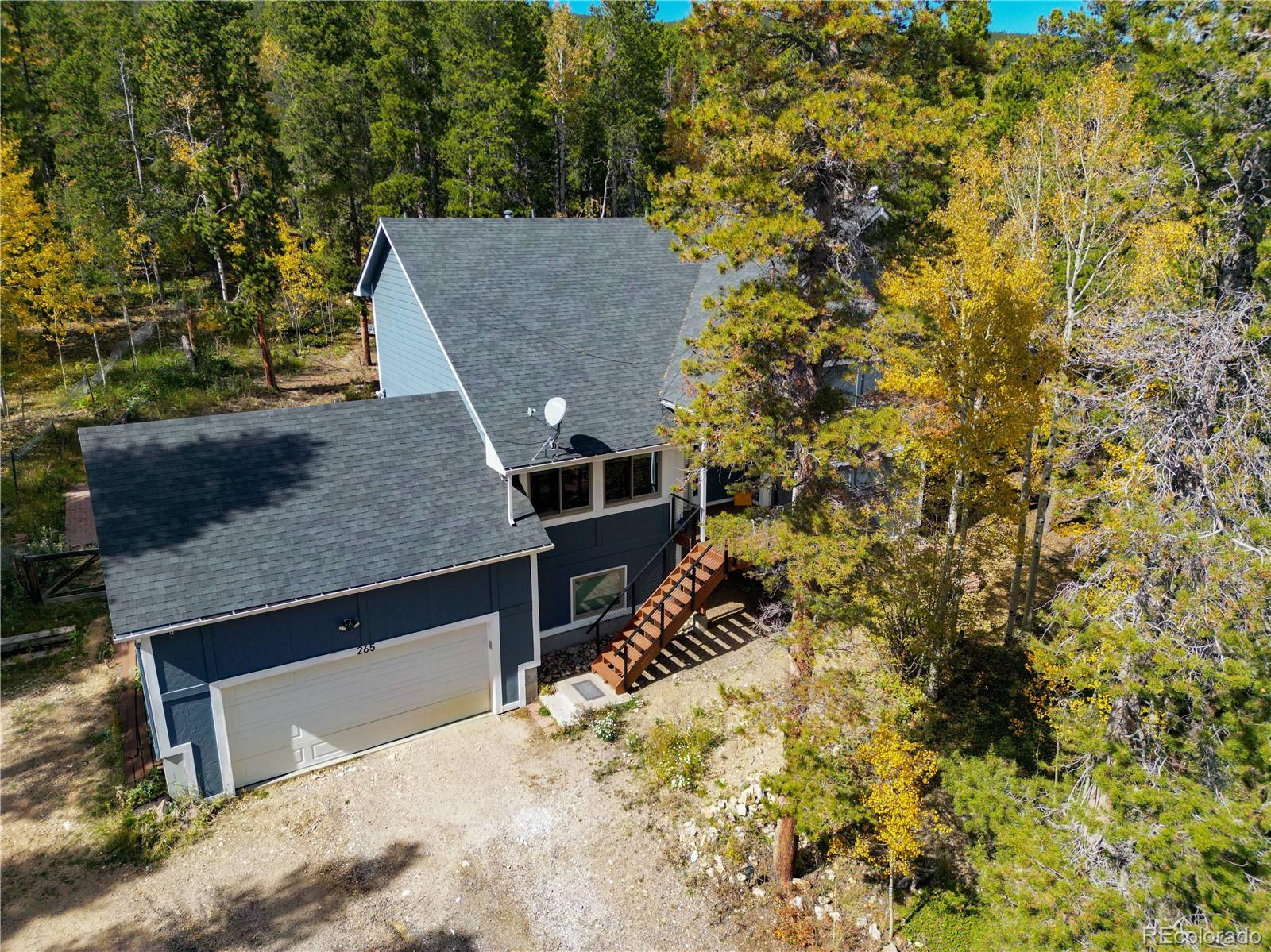 265 Caesar Road Black Hawk, CO 80422 - Photo 3 of 42 front view of a house with a yard