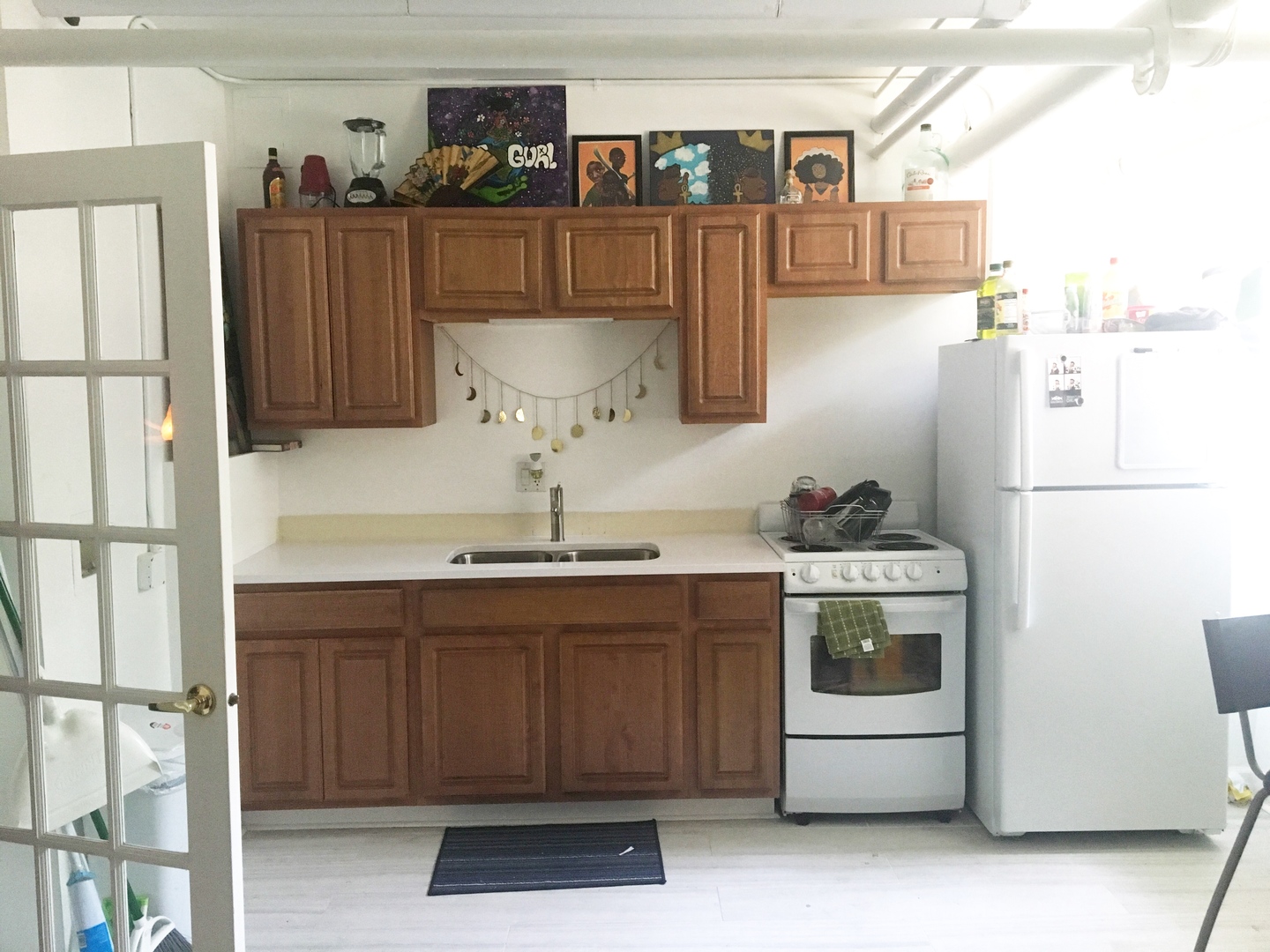 Undisclosed Address Chicago, IL 60647 - Photo 4 of 9 a kitchen with stainless steel appliances a stove and refrigerator