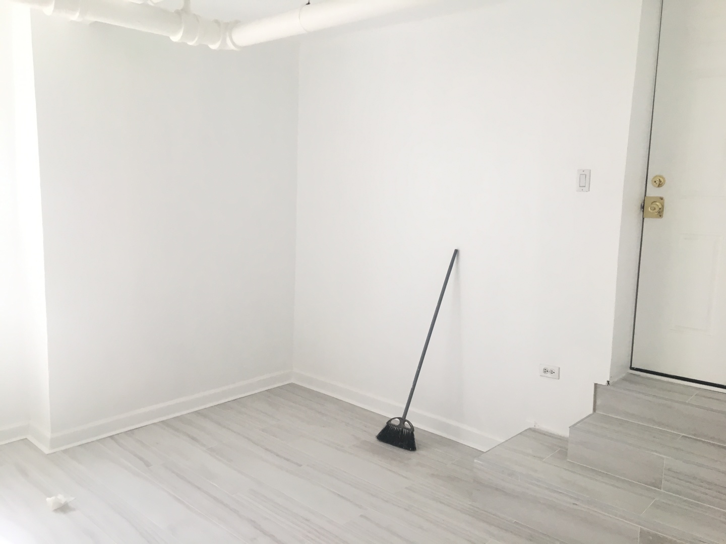 Undisclosed Address Chicago, IL 60647 - Photo 8 of 9 a view of a room with wooden floor