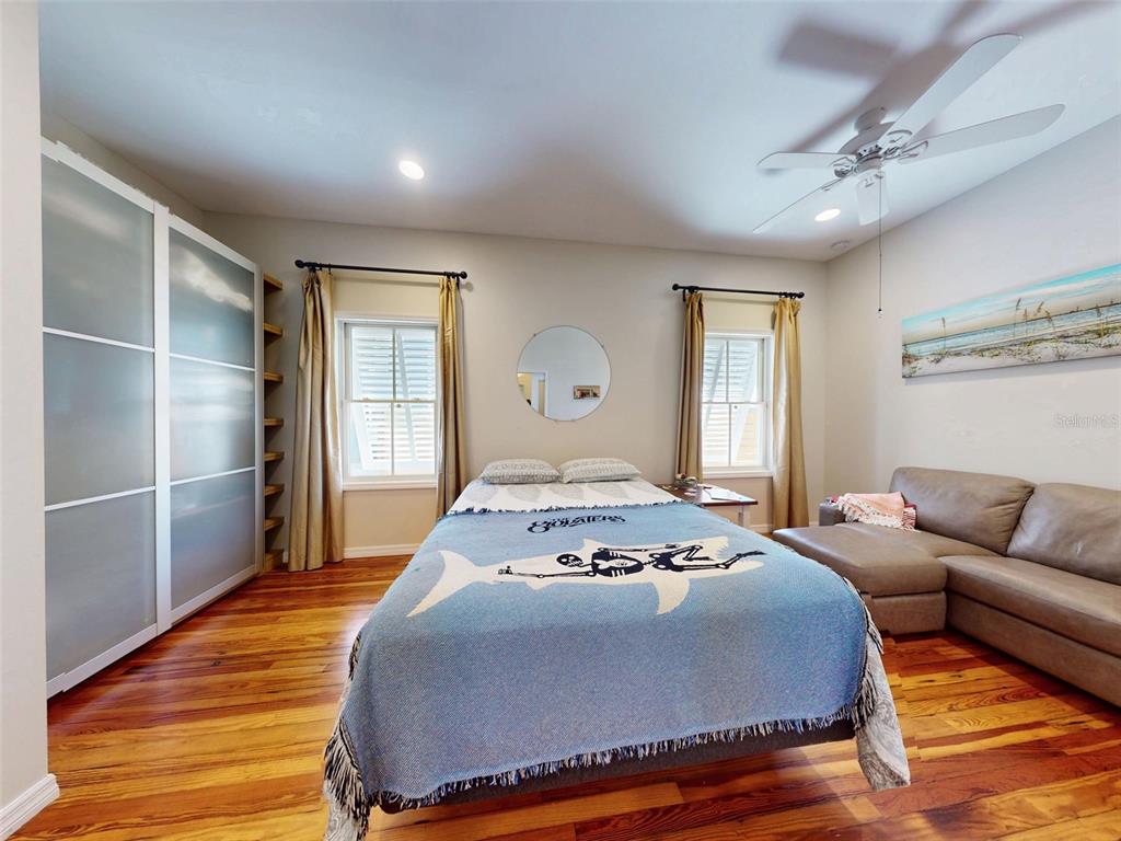 536 Faulkner Street New Smyrna Beach, FL 32168 - Photo 23 of 57 a bedroom with a bed and window