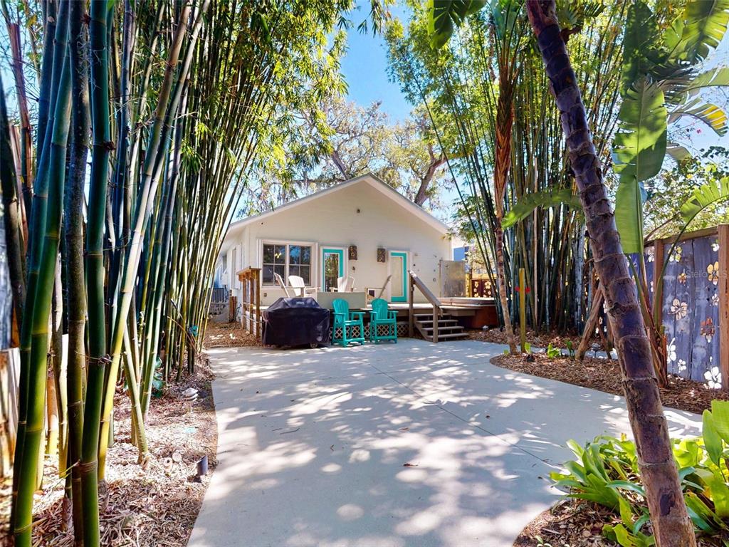 536 Faulkner Street New Smyrna Beach, FL 32168 - Photo 40 of 57 a view of a house with backyard and sitting area