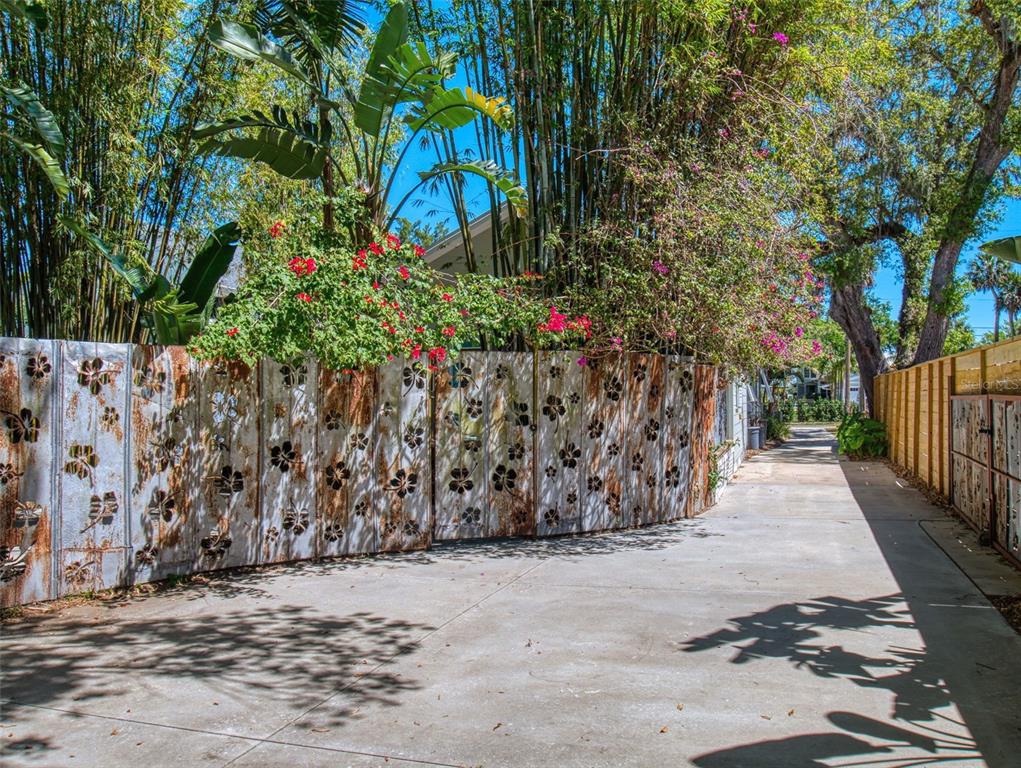 536 Faulkner Street New Smyrna Beach, FL 32168 - Photo 54 of 57 a view of a pathway with a tree