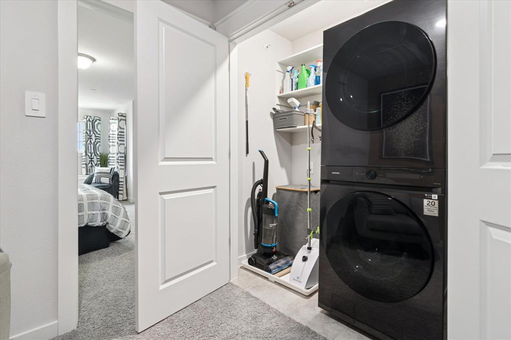 3047 Tenor Way Sachse, TX 75048 - Photo 16 of 17 a utility room with wooden floor washer and dryer