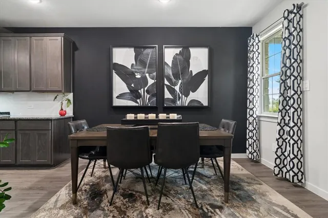 a view of a dining room with furniture