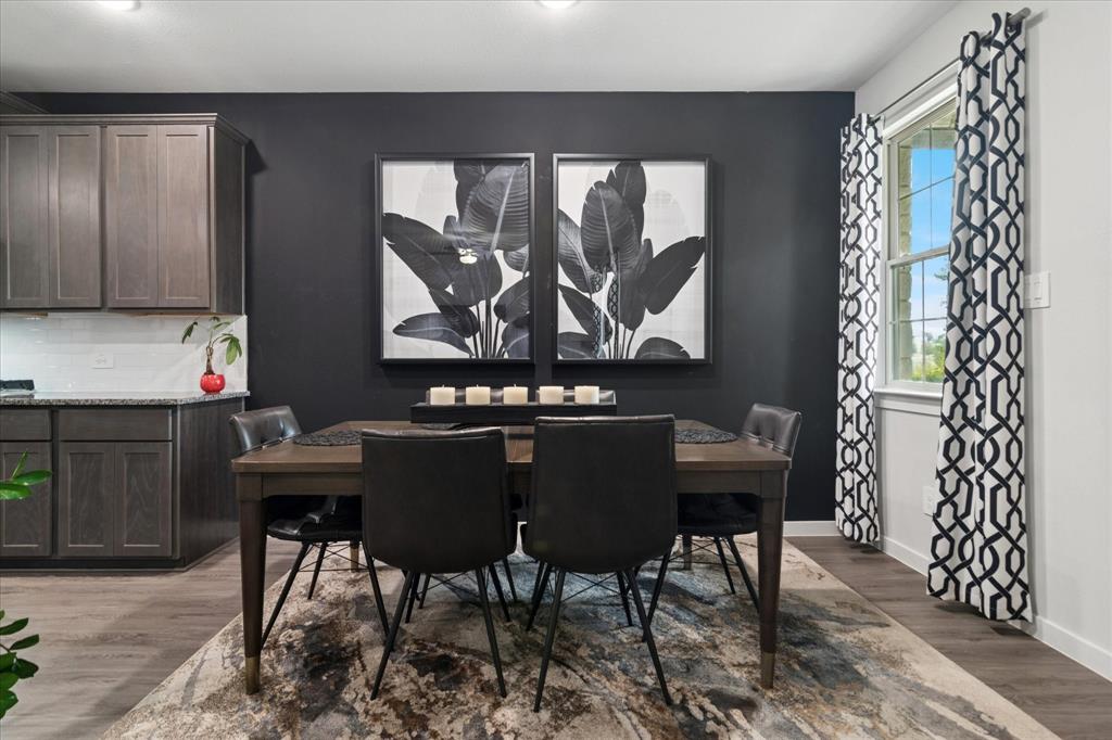 3047 Tenor Way Sachse, TX 75048 - Photo 2 of 17 a view of a dining room with furniture