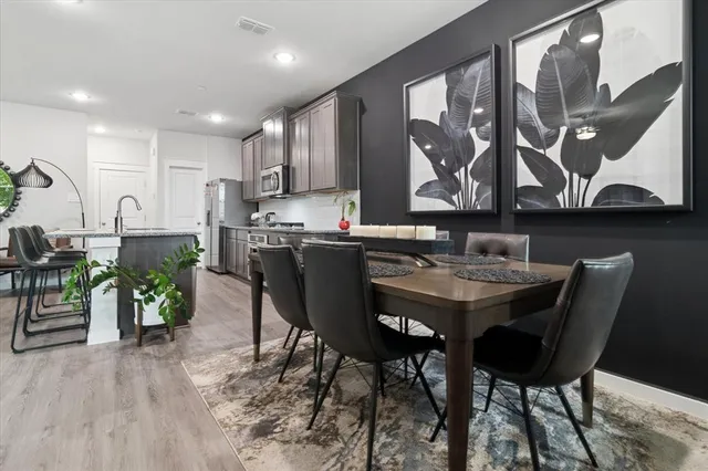 a view of a dining room with furniture