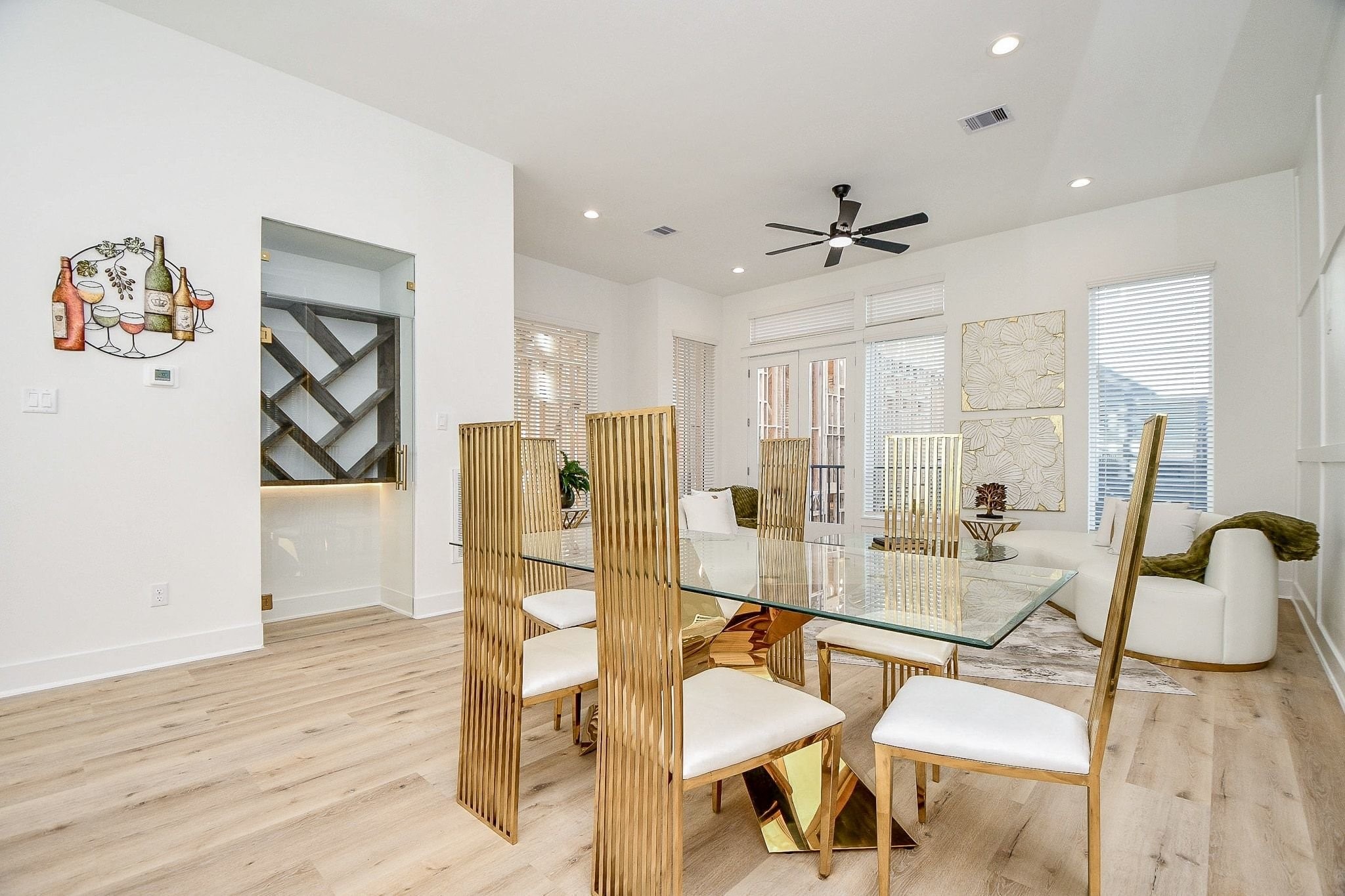 5611 Val Verde Street, Unit A Houston, TX 77057 - Photo 12 of 31 a view of a workspace with furniture and wooden floor
