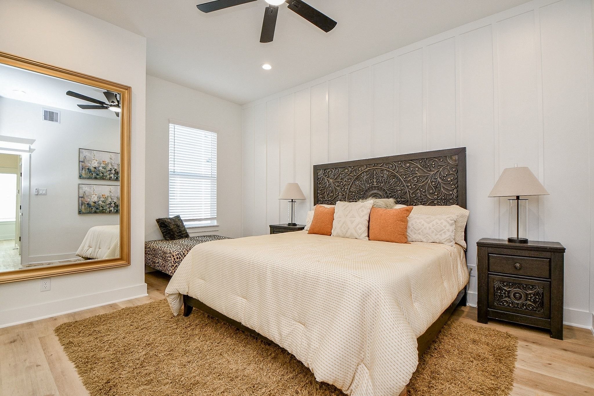 5611 Val Verde Street, Unit A Houston, TX 77057 - Photo 15 of 31 a bedroom with a bed and wooden floor
