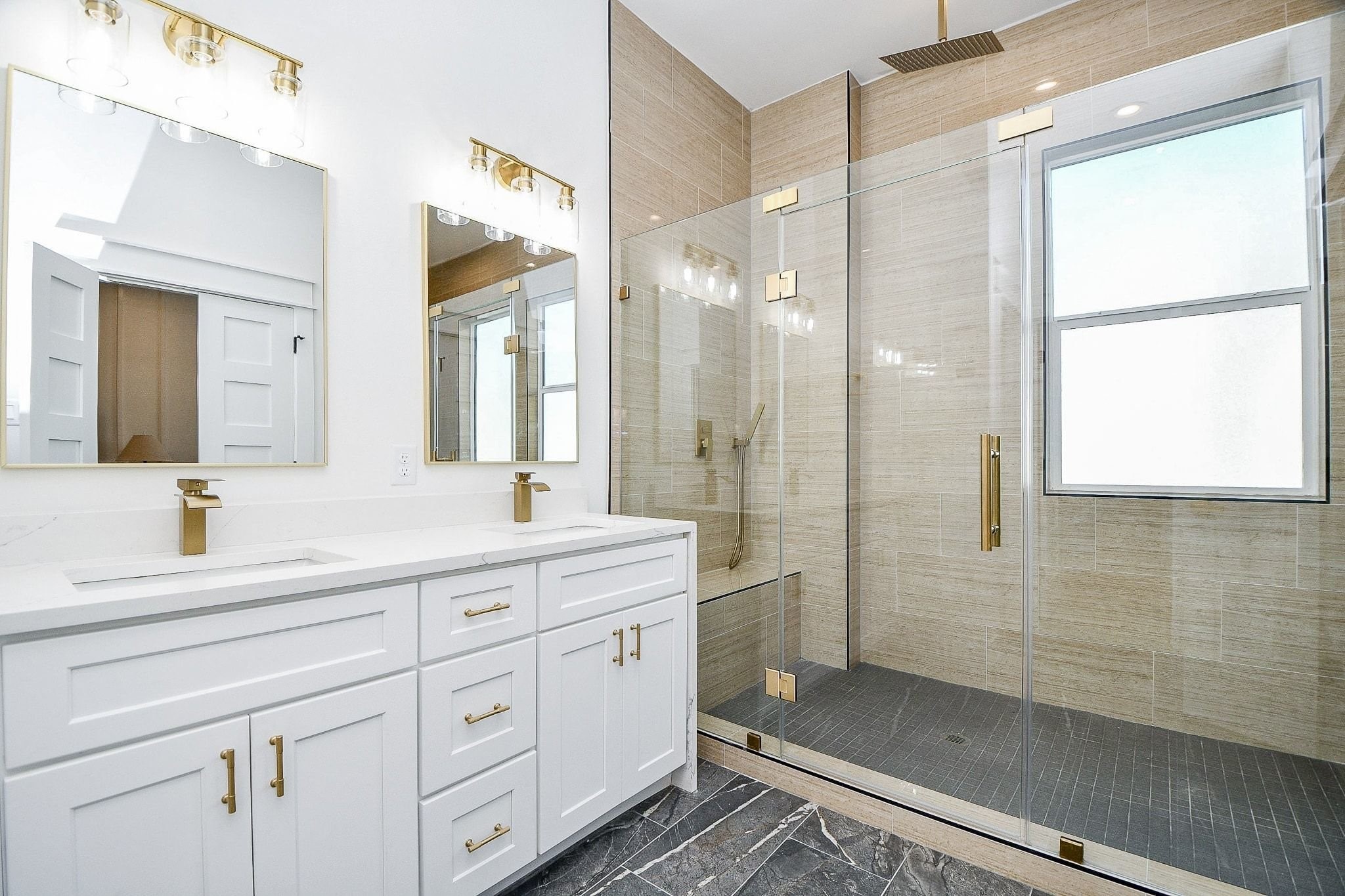 5611 Val Verde Street, Unit A Houston, TX 77057 - Photo 16 of 31 a spacious bathroom with a shower sink and mirror