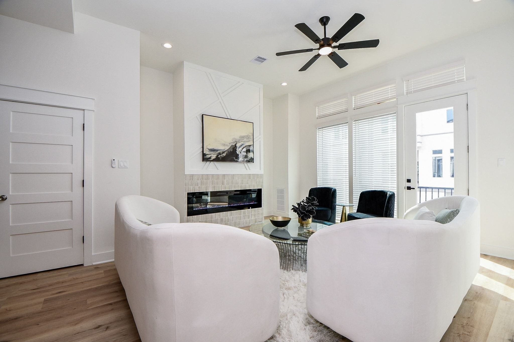 5611 Val Verde Street, Unit A Houston, TX 77057 - Photo 28 of 31 a living room with fireplace furniture and a window