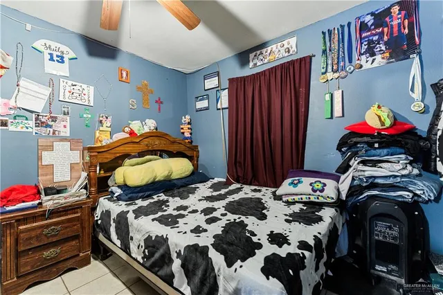 a bedroom with a bed and cabinets