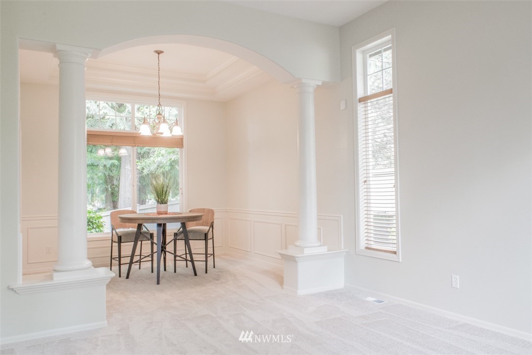 302 172nd Place Southeast Bothell, WA 98012 - Photo 11 of 20 a dining room with furniture and window