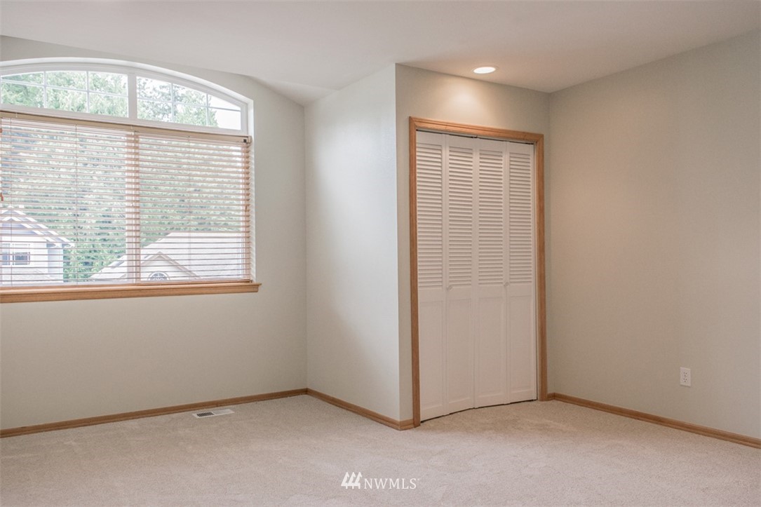 302 172nd Place Southeast Bothell, WA 98012 - Photo 13 of 20 an empty room with a window