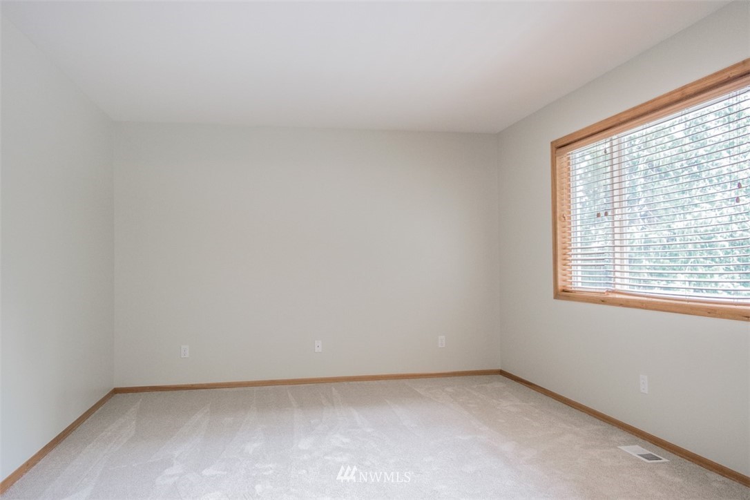 302 172nd Place Southeast Bothell, WA 98012 - Photo 14 of 20 an empty room with a window
