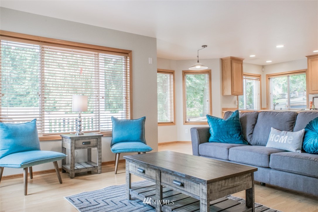 302 172nd Place Southeast Bothell, WA 98012 - Photo 8 of 20 a living room with furniture and a large window