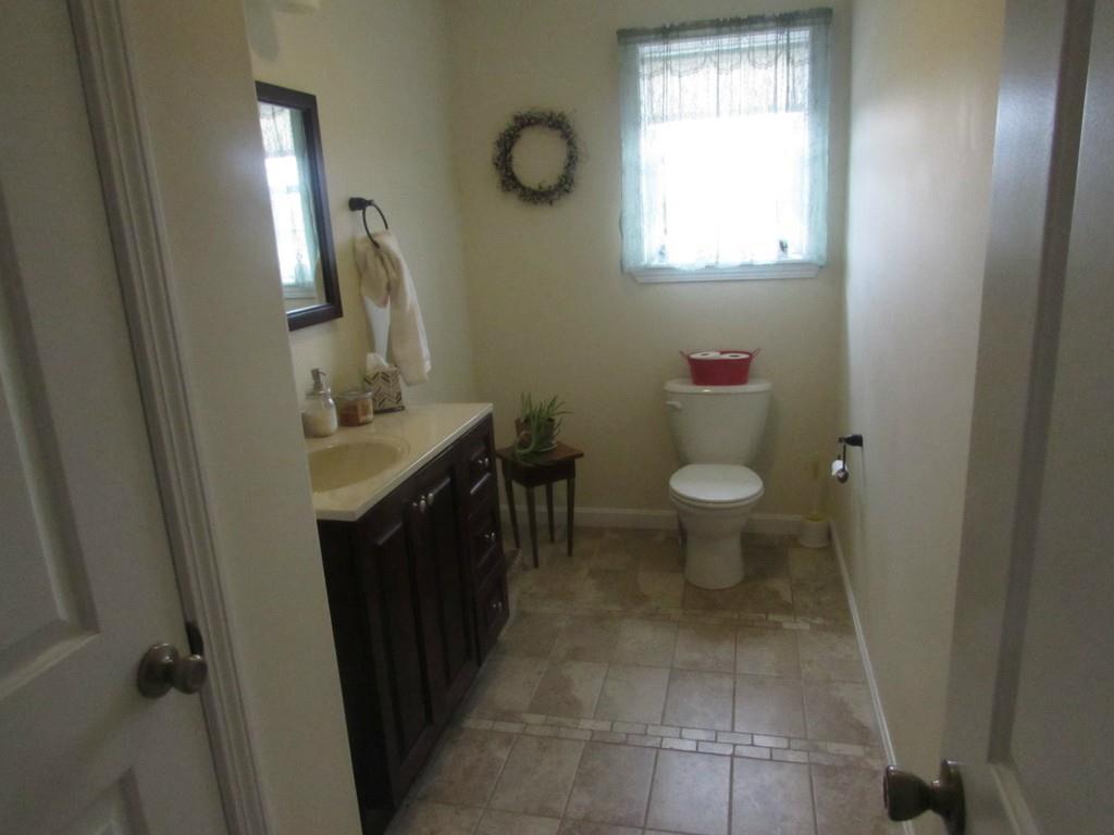 933 Fuller Road Hermon, ME 04401 - Photo 13 of 26 Guest 1/2 bath on main floor....