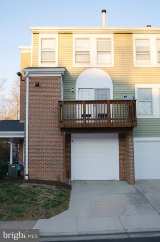 a view of a balcony with furniture