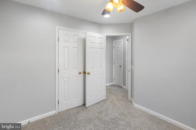 an empty room with a bathroom