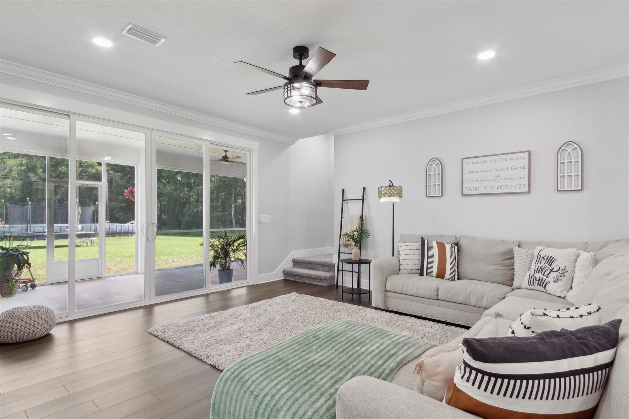 15550 County Road 108 Hilliard, FL 32046 - Photo 13 of 64 a living room with furniture and a large window
